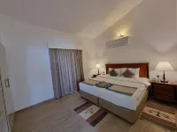 Holiday Beach Resort Hôtels à : Al Fqait