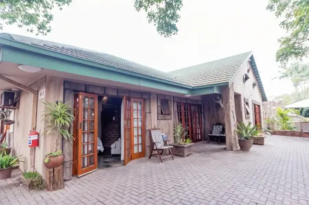 61 on Ireland Guest House and Conferencing Отели рядом с достопримечательностью «Peter Mokaba Stadium»