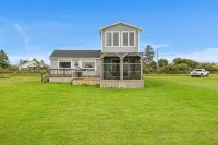 Seashell by the Seashore: Cozy 1BR Cottage Steps from Private Sandy Beach - 2-Star