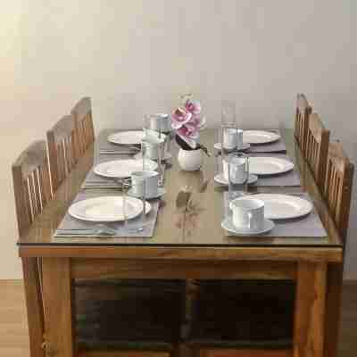 Affordable, friendly, central location, close to malls, Free parking. Furnished! Dining/Meeting Rooms