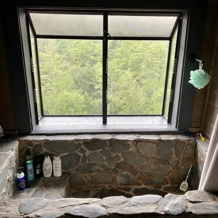 Private Mountain View cabin on 5 acres, great patio with creek below back patio.