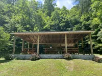 Beautiful 4 unit lodge w/ Hot tub, WiFi, fire pits &  pavilion area with grills