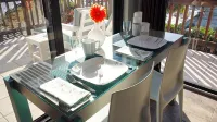 Corner Suite "Glass House on the Sea" Modern Luxury on Sapphire Beach - 4-Sterne