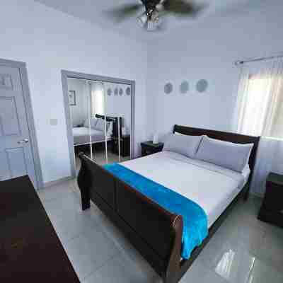 A Clean and Cozy Family Villa Just Steps From the Beach Rooms