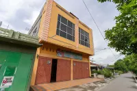 OYO 93071 Home Stay Kembar Syariah Hotels near House of Representatives Building of Binjai City