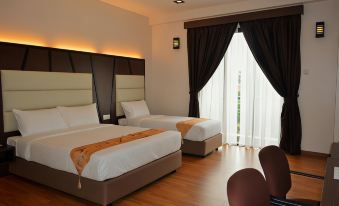 a hotel room with two beds , a large window , and wooden flooring , as well as a dining area at Hotel Grand Baron