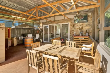 Harmony at Tower Hill Отели в г. Коройт