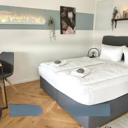 Close to the city center with parking space, balcony, lockable bike box & charging station