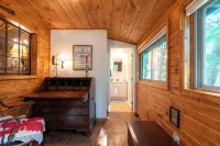 Quaint and cozy log  and knotty pine cabin close to lakes.