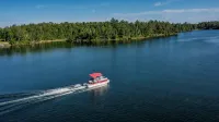 Tiny bungalow secluded in the woods with lake view.  Pets accepted!