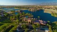 "Luxury Lakefront Paradise: Heated Pool Haven with Unrivaled Views"