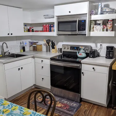 Lovely basement apartment with covered outdoor patio.