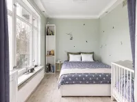 Charming 2-Bedroom Apartment in Rejmyre with Garden View - homestay