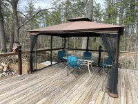 Cozy countryside cottage located on Crooked river in Naples Maine.