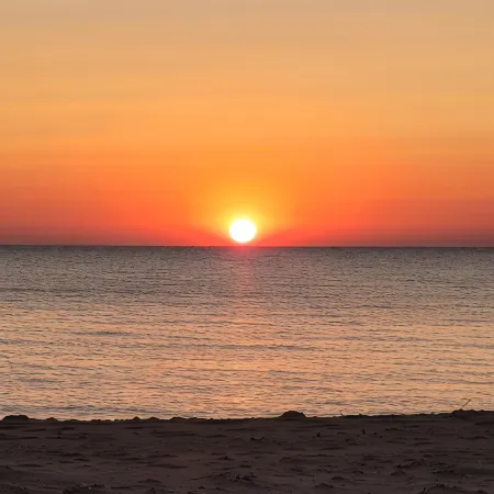 "Huron Winds" a charming 3-bedroom house just steps from Lake Huron in Oscoda