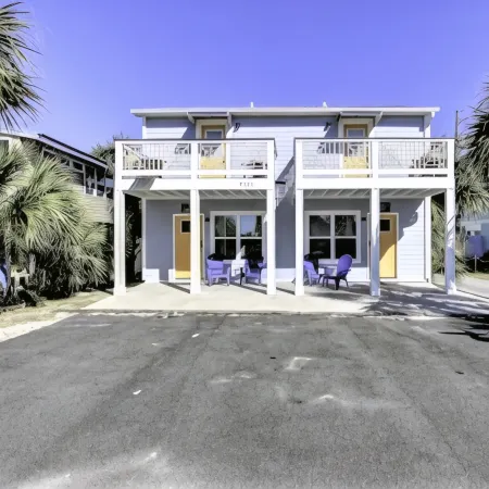 Gulf View Condo with Pool & Grills. Minute walk to Beach. Pet-Friendly!
