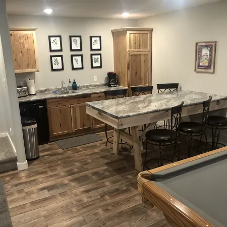 Spacious home with Hot Tub, bikes, fire pit, pool table and more!!