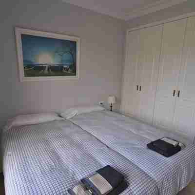 Last minute wifi free - Heated pool - Terrace apartment directly on the beach Rooms