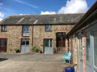 Barn conversion overlooking the golf course to the sea - ブティック