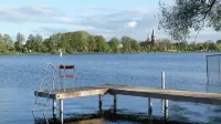House on the Havelbogen directly on the water with canoe and jetty, garden apartment - Family