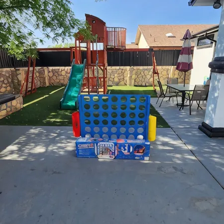 Stylish 5 bed 2.5 bath, with loft, pool table, amazing outdoor bar, kid playset.