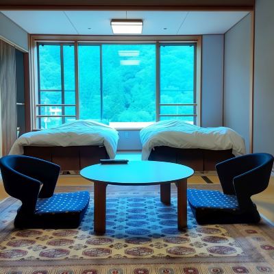 和洋折衷スタイルスタンダードマウンテンビュールーム 鶯宿温泉 長栄館の写真