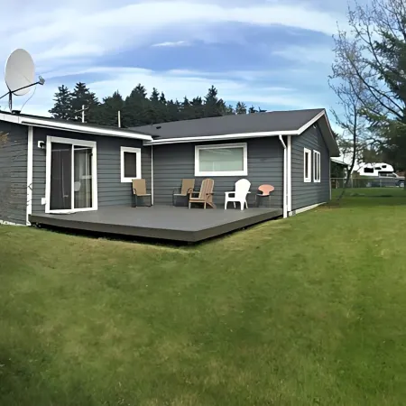 3 bed 2 bath house w/ covered parking spot and fenced backyard.