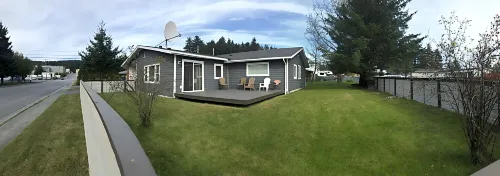 3 bed 2 bath house w/ covered parking spot and fenced backyard.