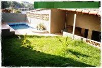 Suítes de Setiba - Hospedaria Oca Ruca