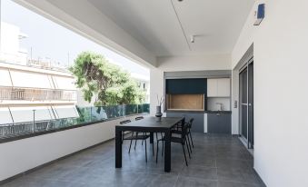 Teal Faliro House by Upstreet