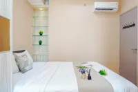 Comfy and Homely Space 2BR at Apartment Vasanta Innopark By Travelio - Homestays