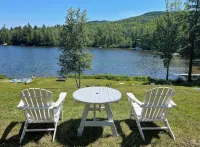 Quaint lakefront; firepit, boat, kayaks, paddleboard, grill, laundry, hammock - Wifi