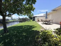Cozy Water Front 2 Bedroom 2 Bathroom Home with Lake Access and Fenced Backyard.