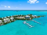 Waterfront Villa with Dock, Walk to Beach Club & Rusty Anchor Rest. 3b/r  3.5b/a - Gym