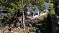 Lakeside Landing is on the Water with Beautiful Views and a Large Deck.