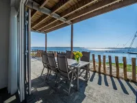 Exclusive Apartment on the Ground Floor Directly Located on the Water Hotels in Kamperland