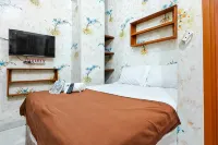Queen Residence Ancol RedPartner - guesthouses