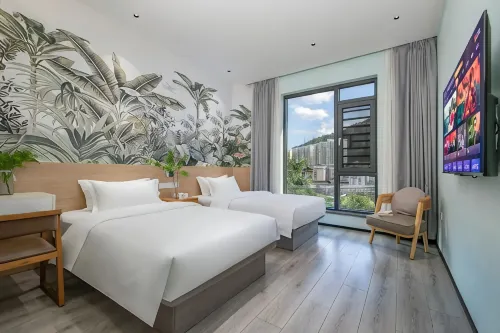 Muqi Jiushe Design B&B (Longyan Railway Station Minxi Trading City)