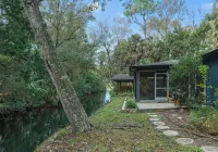 Mellow Manatee Cottage - on canal with boat house - Kayaks, Manatees, Private - Boutique
