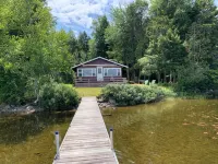 This beautiful cottage is set back 25 feet from Bog Lake in Northfield, Maine!