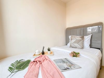 Cozy and Trendy 2BR Apartment Meikarta By Travelio