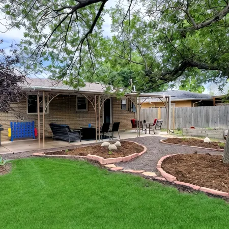 Family Friendly Central Retreat with Covered Patio, AC, Fenced Yard