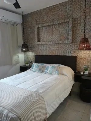 Linda casa con alberca y cascada.