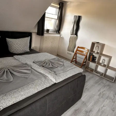 Cozy vacation apartment with a view of the Harz Mountains, near the center of Bad Harzburg Отели в г. Бад-Гарцбург