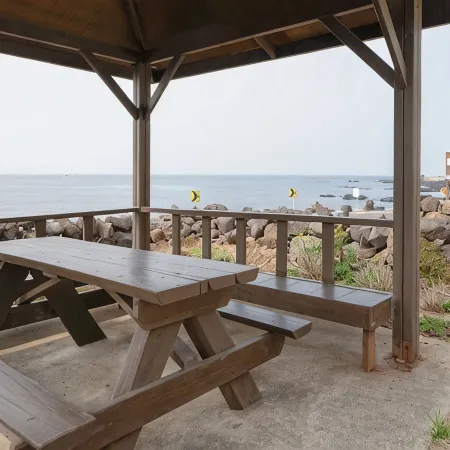 Jeju Bahama Pension Отели рядом с достопримечательностью «Храм Когванса»