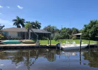 Family beach home! Fully renovated on water w/pool, boat dock & nearby beach