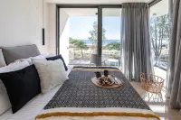 Ikies 3 Modern Eco-Friendly Private Seaview Signature Villas with a Pool