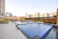 FabHotel Prime Spectrum Metro - with Pool |  5 Mins Walk from Sector 75 Metro - Pool