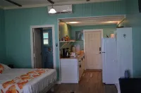 Beachfront large one bedroom studio, adjoining studio can be added to make 2/2. Hotels in 