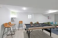 Spacious Modern 4Br Urban Retreat with Game Room, Yard, Near Path Train& NYC Bus - 4-Star